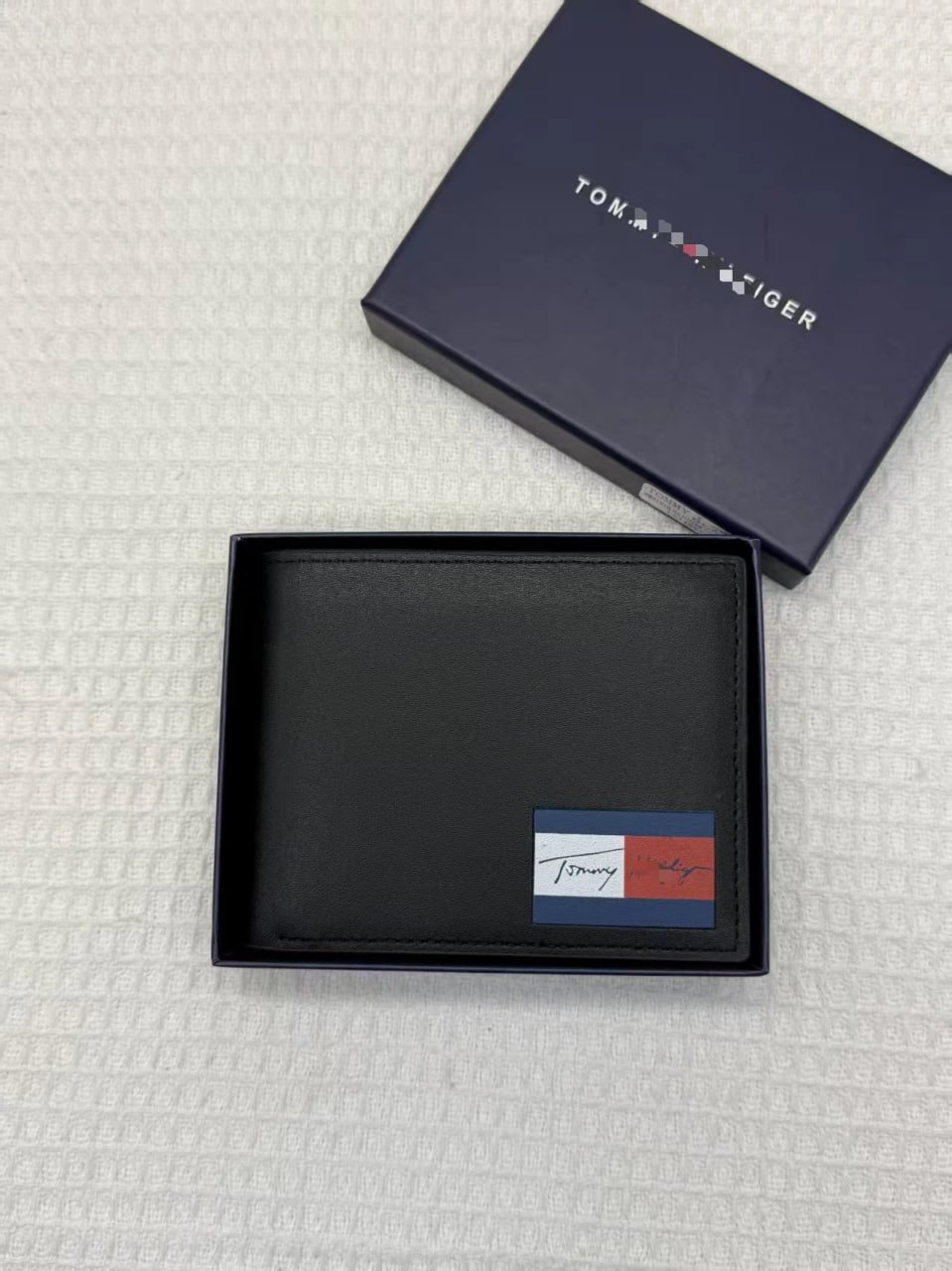 Tommy wallet